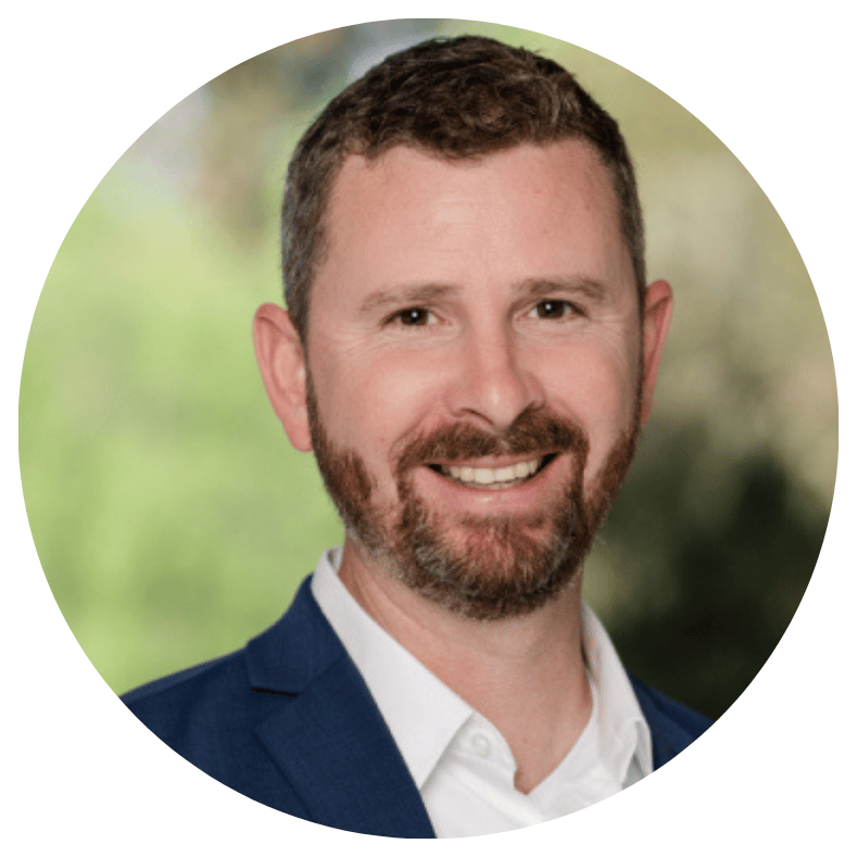 A professional leader in a blazer, representing strategic alignment and sustainable growth.